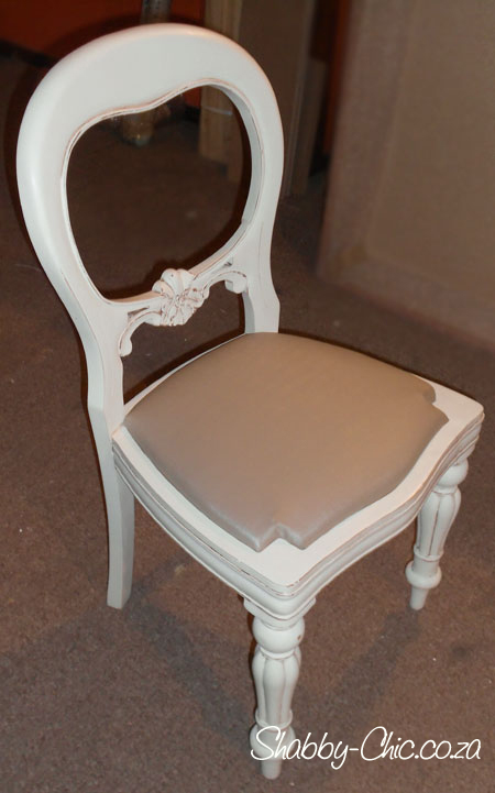 Distress and upholster dining chairs