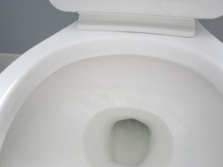 Remove dark stains from toilet 