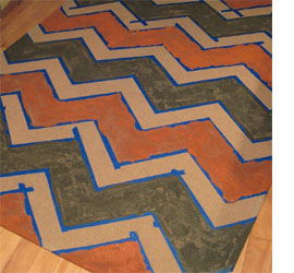 Paint an old rug with chevron stripes 