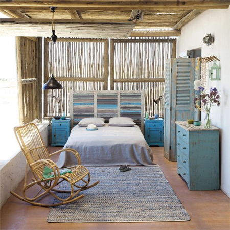 Decorate a home in modern rustic style bedroom with pole beams brach window frame panels