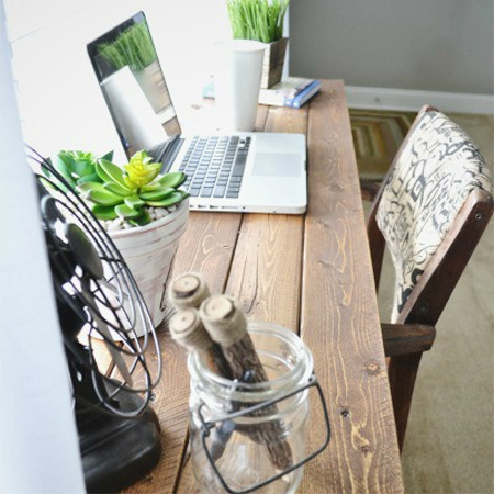 Bar stools make a perfect desk for home office wooden desktop