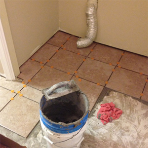 How to tile a kitchen floor start at the furthest corner
