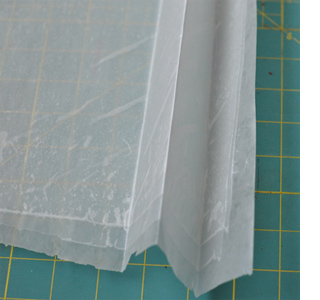 Make a capiz chandelier with wax paper
