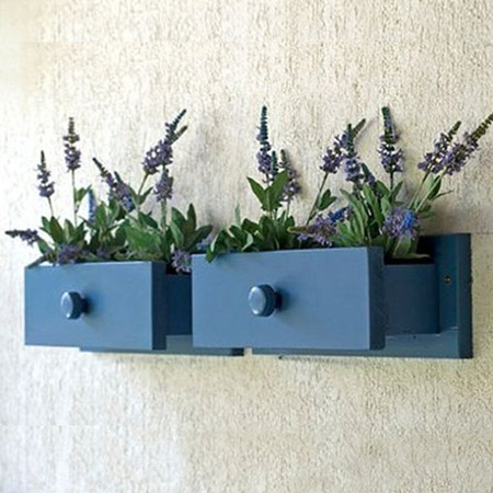 Repurpose an old drawer into wall flower boxes planters