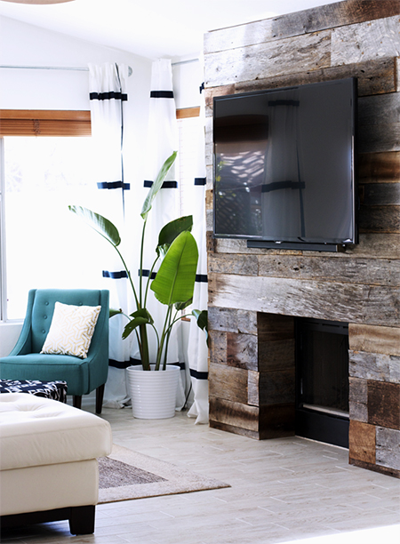 Reclaimed wood fireplace surround wall mounted flatscreen tv