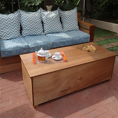 outdoor patio sofa with upholstered cushions