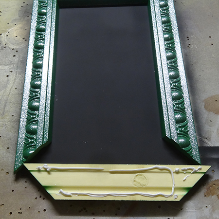 Use pattex no more nails adhesive to mount frame to chalkboard