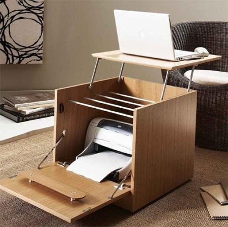 A basic cube has been modified to allow for a modular home office workstation that can be set up anywhere. Flap hinges mounted on the top and a side allow easy opening and closing.