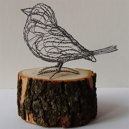 steel wire bird on a tree stump crafty ideas