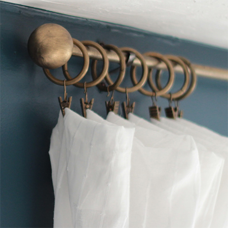 PVC pipes and ping-pog ball curtain rod and finials!