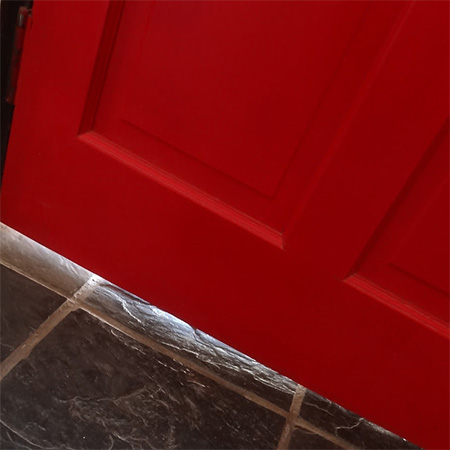 Large gaps under doors let in water and wind, yet it's so easy to cover up these areas with a door sweep
