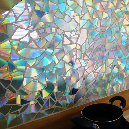Recycle CD's into a gorgeous shimmering backsplash for kitchen