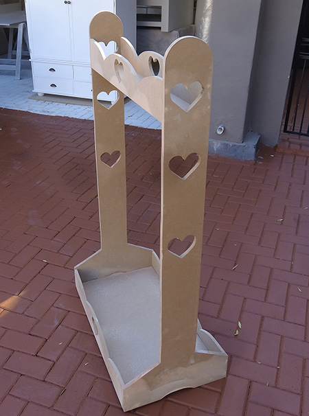 Clothing rail with heart cut outs for little girls bedroom