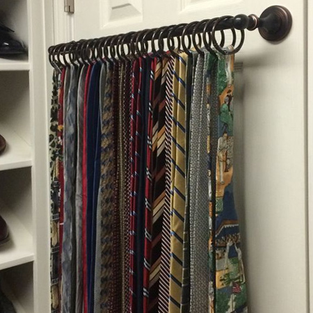tie rack pole mounted on back of closet door for space saving closet ideas