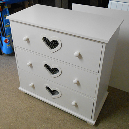 make chest of drawers with heart cut out and distressed finish