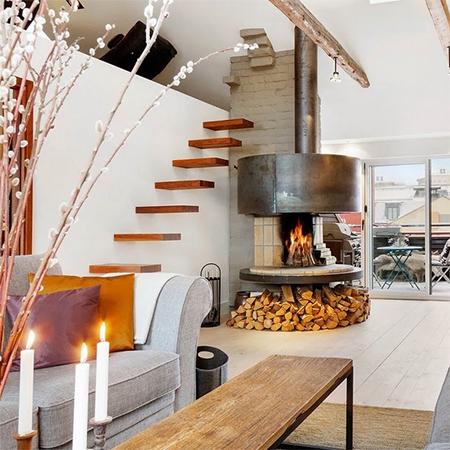 Attic  or loft  conversion becomes spacious living space fireplace