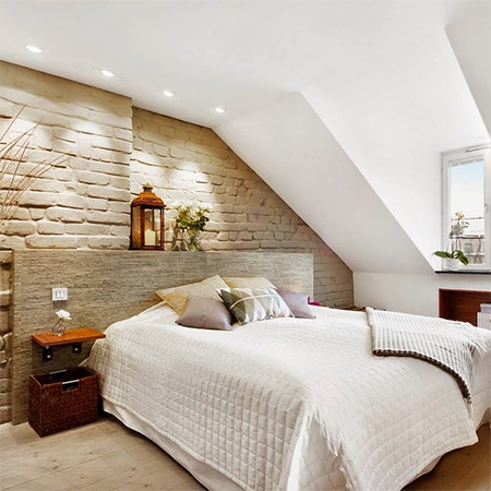 Attic conversion becomes spacious living space bedroom