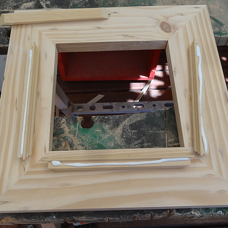 9. Before you glue the moulding in place, do a test fit to make sure the pieces fit snug and tight. Apply wood glue to the moulding and fit to the inside of the frame. 