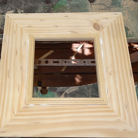 Apply wood glue to the moulding and fit to the inside of the frame. 