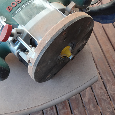 bosch router with tork craft roundover bit for edge of table top