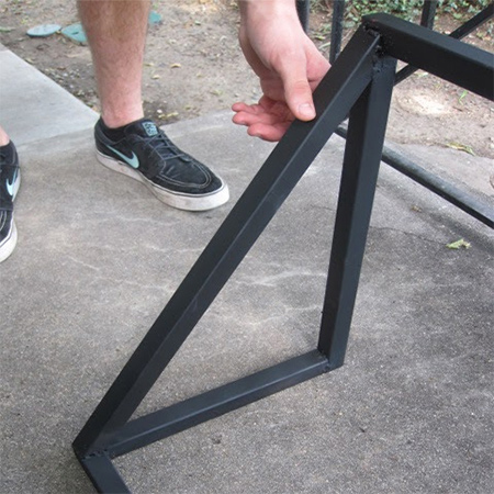 The frame for the awning consists of two cross pieces joined at the sides. You can have someone make up a triangular frame for the awning if you don't have basic welding skills or the equipment to do this yourself. 
