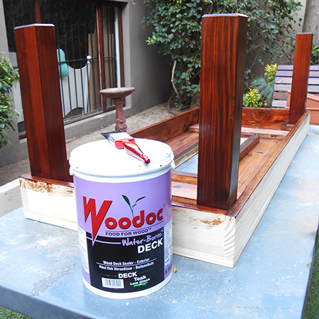 Follow the instructions on the container, applying three coats of woodoc water borne outdoor deck sealer  in total