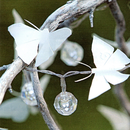 Upcycle white plastic bottles into an outdoor butterfly ornament