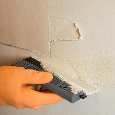 Apply the grout mixture with a grout squeegee, working one square metre at a time and filling the joints entirely to avoid air-pockets or voids.
