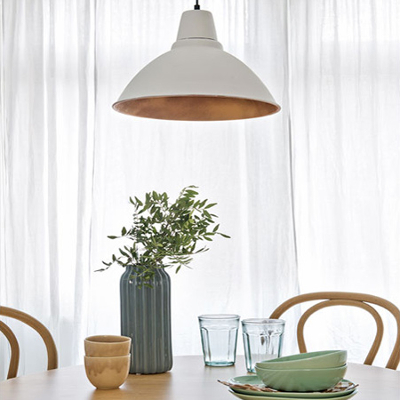 Give a pendant shade an instant update by spraying inside the shade with gold or copper spray paint