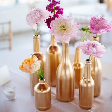 Recycle glass or plastic bottles into a wonderful centrepiece for a special occasion using Rust-Oleum Metallic or Universal spray paint