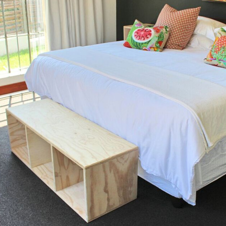 plywood bench at end of bed