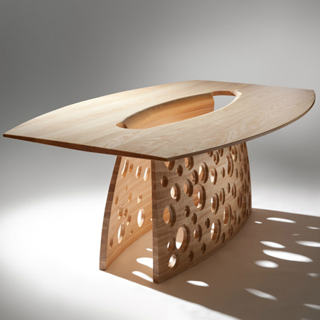 Another John Lee creation, the 'Salcombe Table' is made from solid ash and is a private commission. The inspiration for the design of the Salcome Table  came from eroded sedimentary rock and the effects of erosion. The underside and the outer face of the base have been textured and sandblasted.