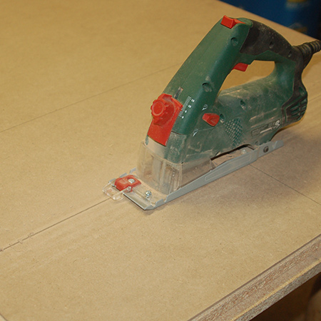 I used my Bosch PKS-16 to cut the sheet down into sections