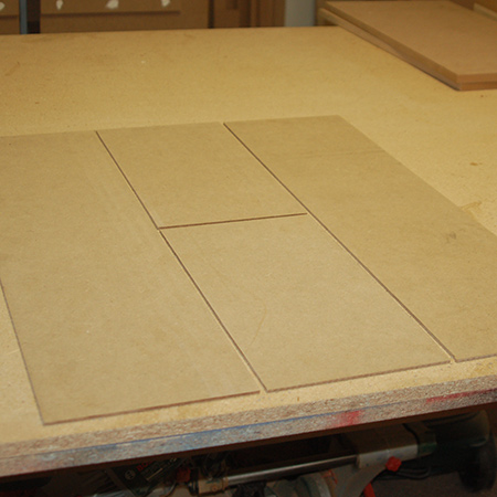 1. Lay the panels out in the formation as shown below. There is a long panel at either side, and two smaller panels in the centre.