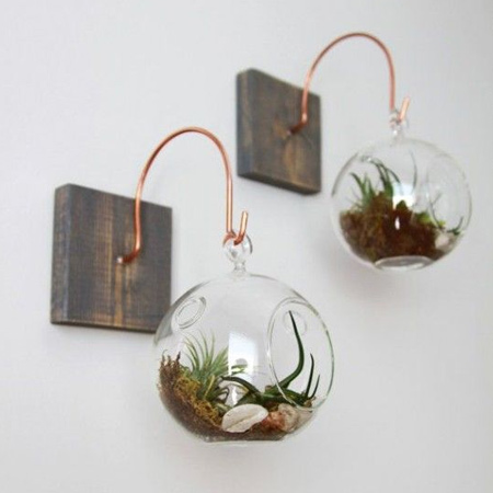 bend medium-gauge copper wire to hang glass plant holders