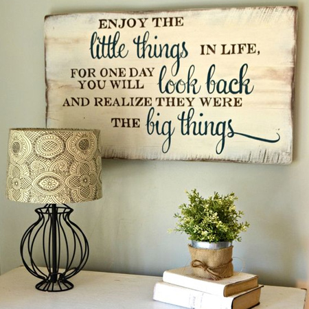 Use reclaimed wood, or even an old door, to add inspirational quotes to a plain wall.