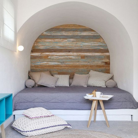 Not a new idea, reclaimed wood - or pine given a technique to make it look aged - it a wonderful way to add a feature to boring walls. Rather than fasten individual planks to walls, it's easier to mount battens (thin strips) vertically on the wall and secure planks or boards to these.
