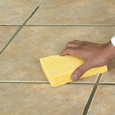 Allow time for the adhesive to dry and then apply grout.