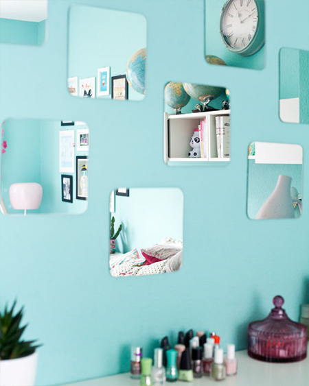 Create the illusion of space by adding a few mirror squares to blank walls