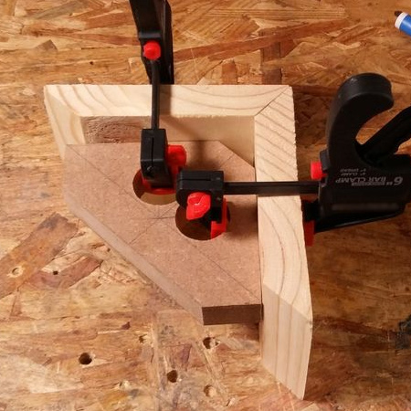 a corner jig that is easy to clamp in place and holds corners perfectly square while you wait for glue to dry! 