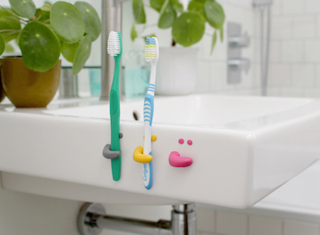 Free up some space around the bathroom basin with these handy smiley face toothbrush holders. Sugru is waterproof and bonds brilliantly to ceramics and metals, so you can easily install hooks, towel rails and toilet roll holders directly onto your tiles without any drilling