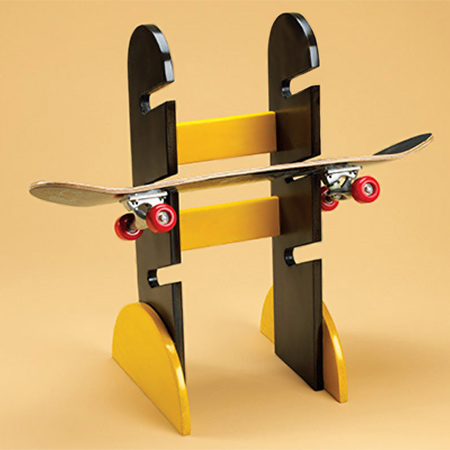 Make this skateboard rack for your kids, or it's a great gift idea. We sprayed outs with Rust-Oleum 2X spray paint.