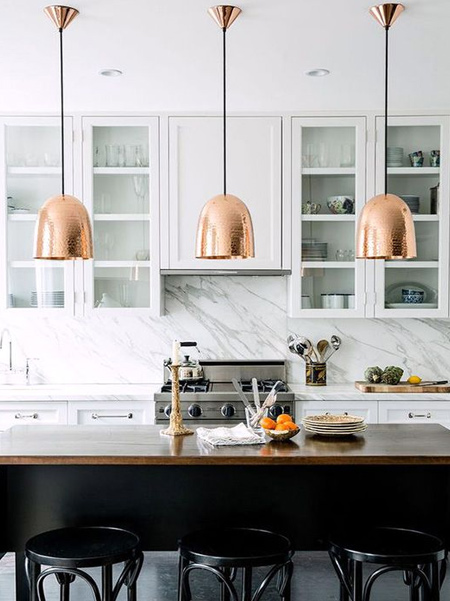 Incorporate the warm hues of rose gold, brass and copper to add a homely luxury