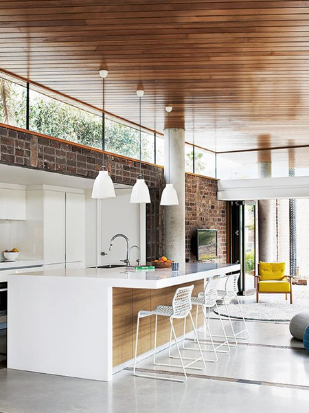 More and more designs are now streamlining kitchens to converge with living spaces