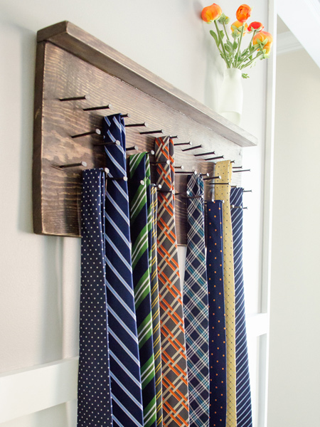 Use offcuts or pieces of reclaimed wood to make a tie or belt rack for your closet, or to mount on a closet door. You can add as many nails (or screws) as you need to your accessories