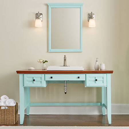Here's a bathroom vanity made from a repurposed desk that is surprisingly easy to make. Apply a new coat of paint, cut a hole for the basin, and your bathroom vanity is ready to install.