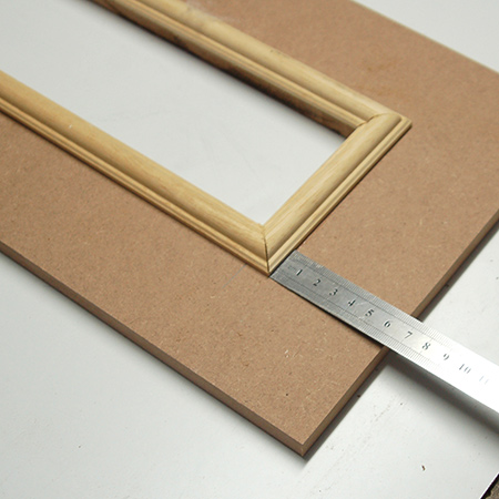 Measure and cut the moulding for the inside of the frame