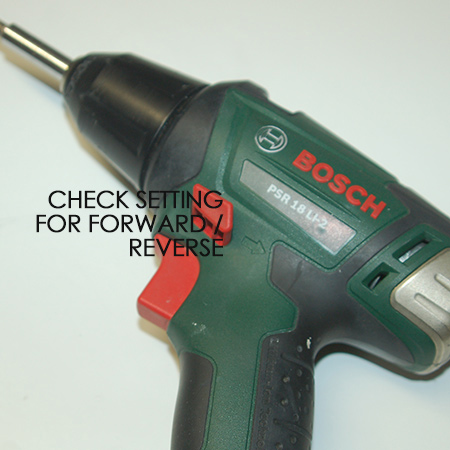 If you own a Bosch Drill / Driver you'll notice that the tool makes it easy to know if you are operating in the right direction. On the side of the drill / driver there is an arrow that indicates forward and reverse. If that's not enough, on top of the drill / driver is a direction indicator light.