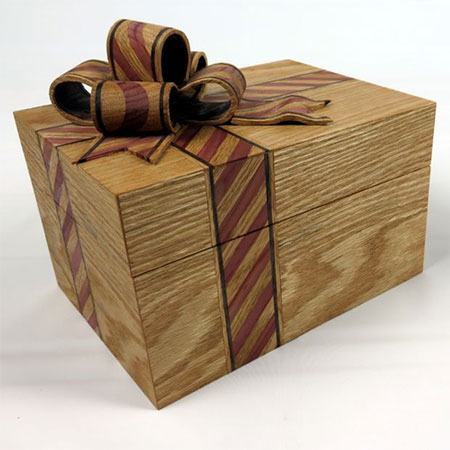 HOME-DZINE | Gift Ideas - This box is so beautiful, the box itself is a gift. The box shown here is made using Red Cedar, Oak and Walnut. With it's inlay of Cedar and Oak, the ribbon detail adds a wonderful finishing touch to a piece that lends itself to becoming a heirloom piece that can be passed down.