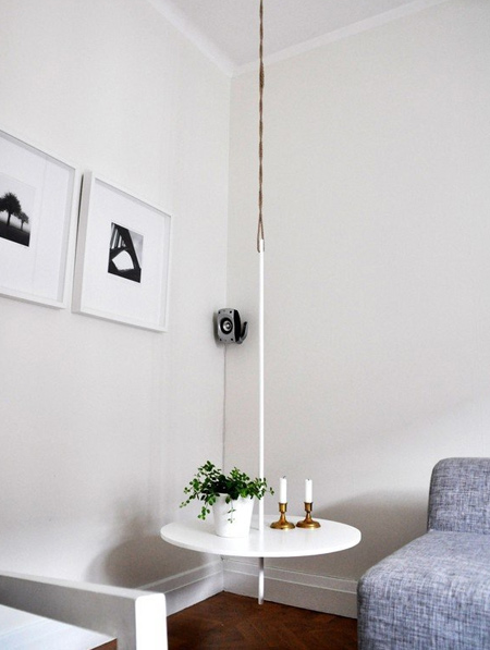 Mount a hanging table in a small room to give the illusion of a much larger space - the more floor that you see, the bigger the room feels.